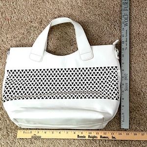 Brand new White Charming Charlie bag